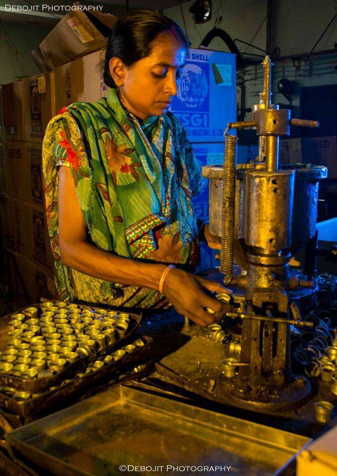 Worker near molten metal machinery
